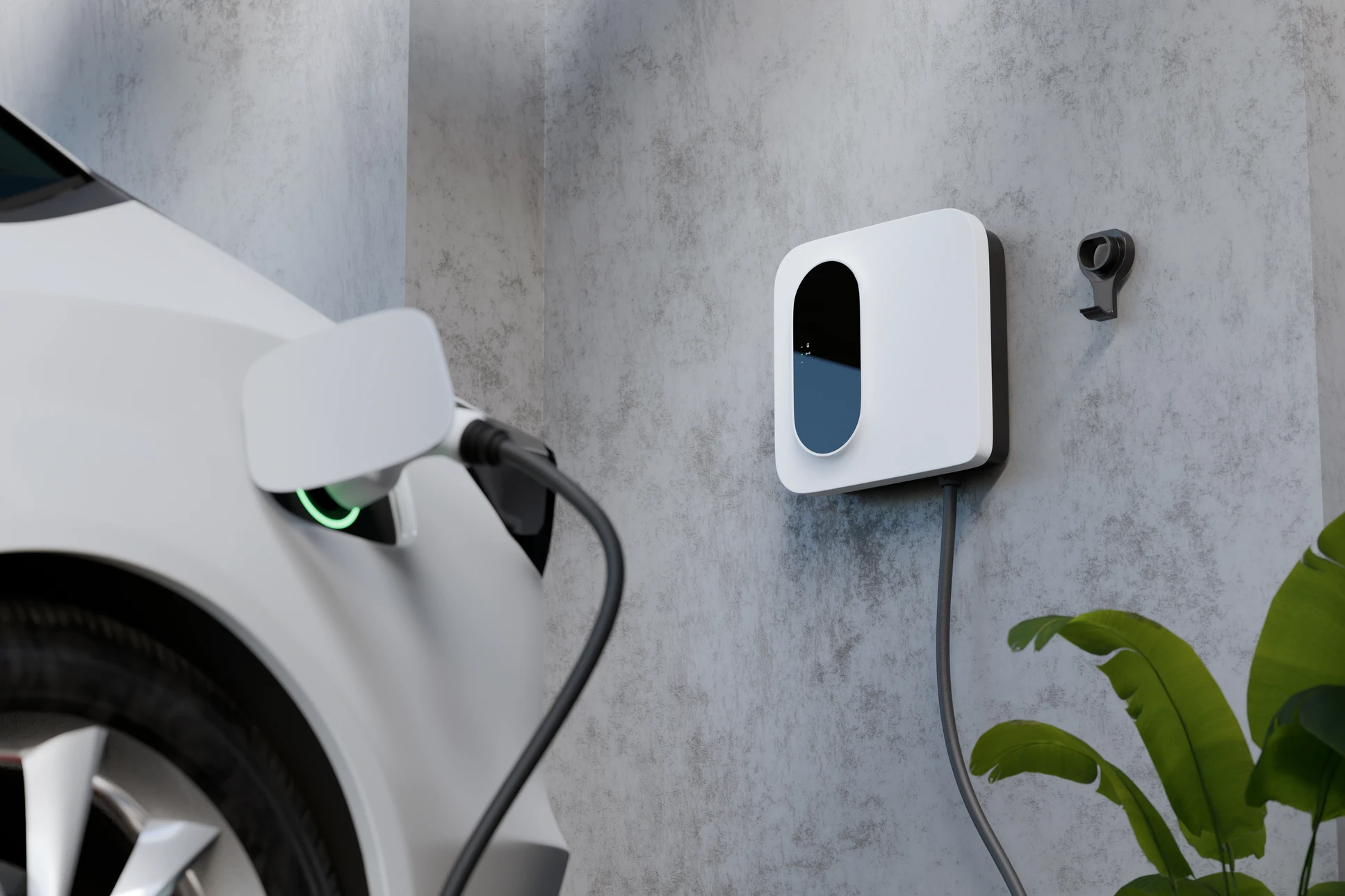 Extérieur, borne de recharge électrique ChargePoint installée dans un environnement résidentiel avec végétation en arrière-plan
